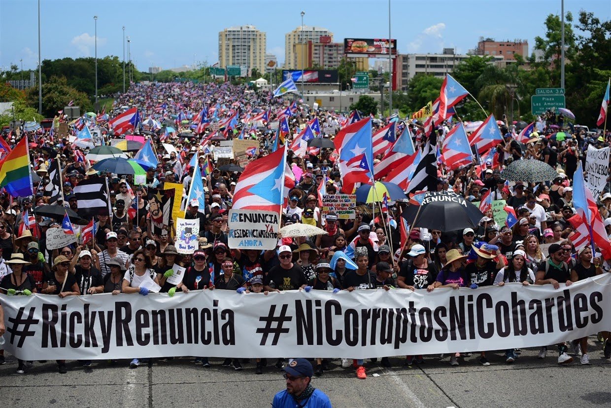 Puerto Ricans flood streets, demand resignation of governor in huge protest