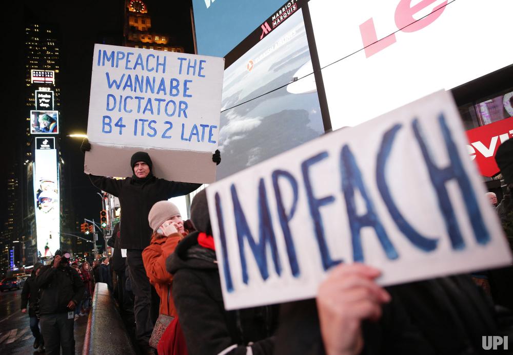Hundreds of people ask for the impeachment of Donald Trump in Times Square