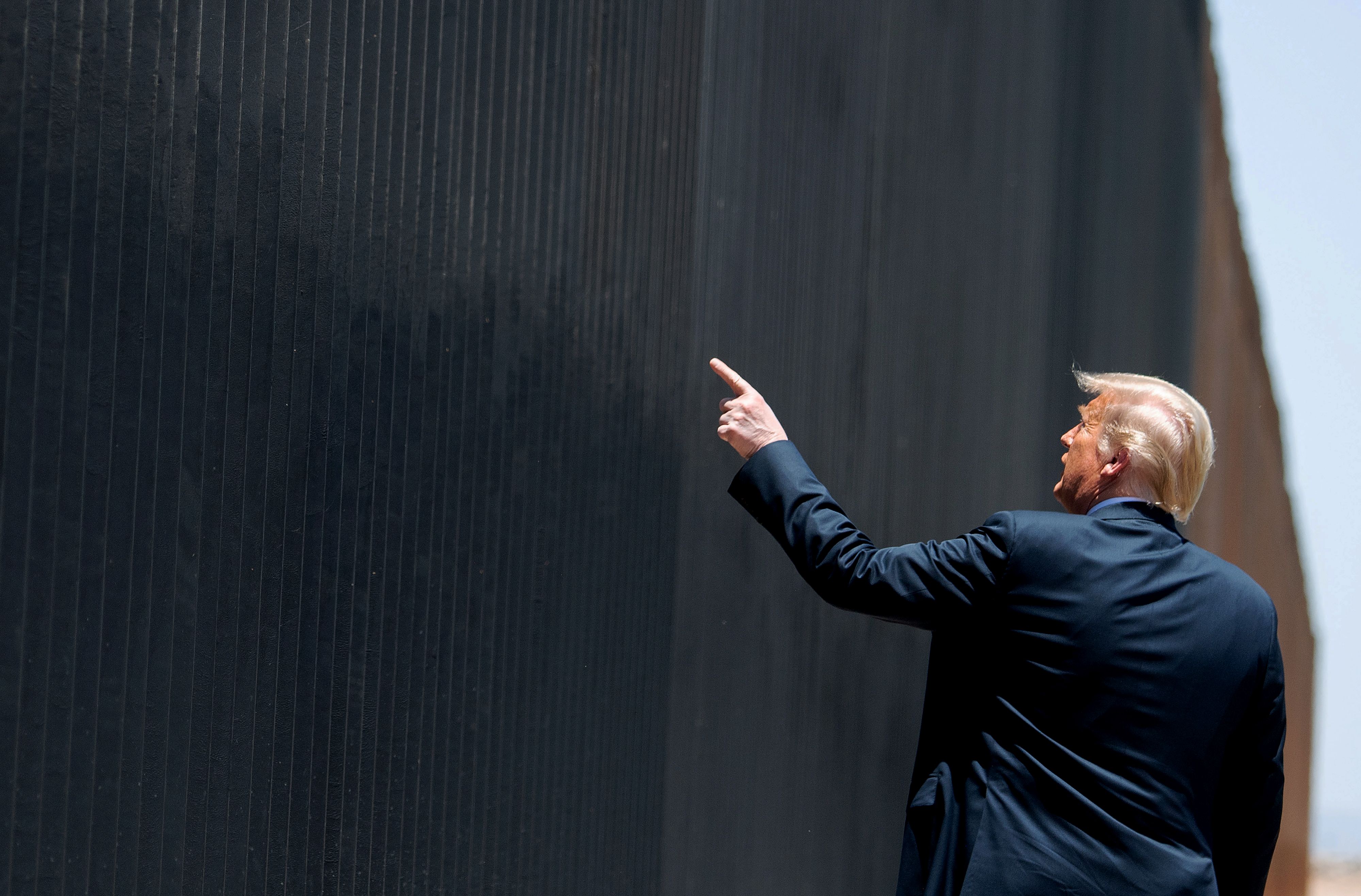 After low turnout at Tulsa rally, Trump visits border wall