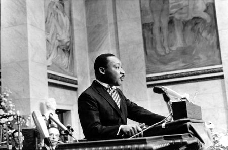 The Rev. Martin Luther King Jr., delivers his Nobel Peace Prize acceptance speech in the auditorium of Oslo University in Norway on Dec. 10, 1964. King, the youngest person to receive the Nobel Peace prize, is recognized for his leadership in the American civil rights movement and for advocating non violence. (AP Photo) ASSOCIATED PRESS