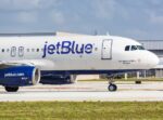 Jetblue passenger attempts to storm cockpit